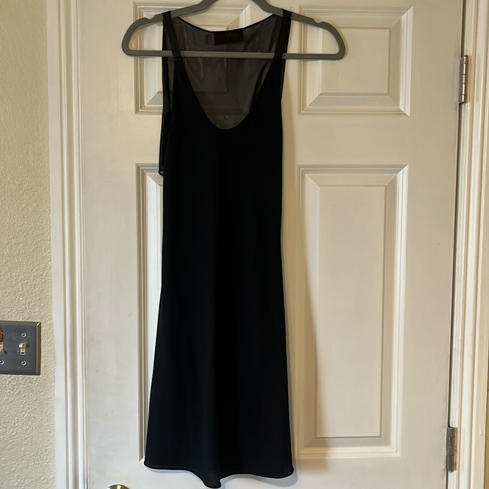 Black mini dress with open back